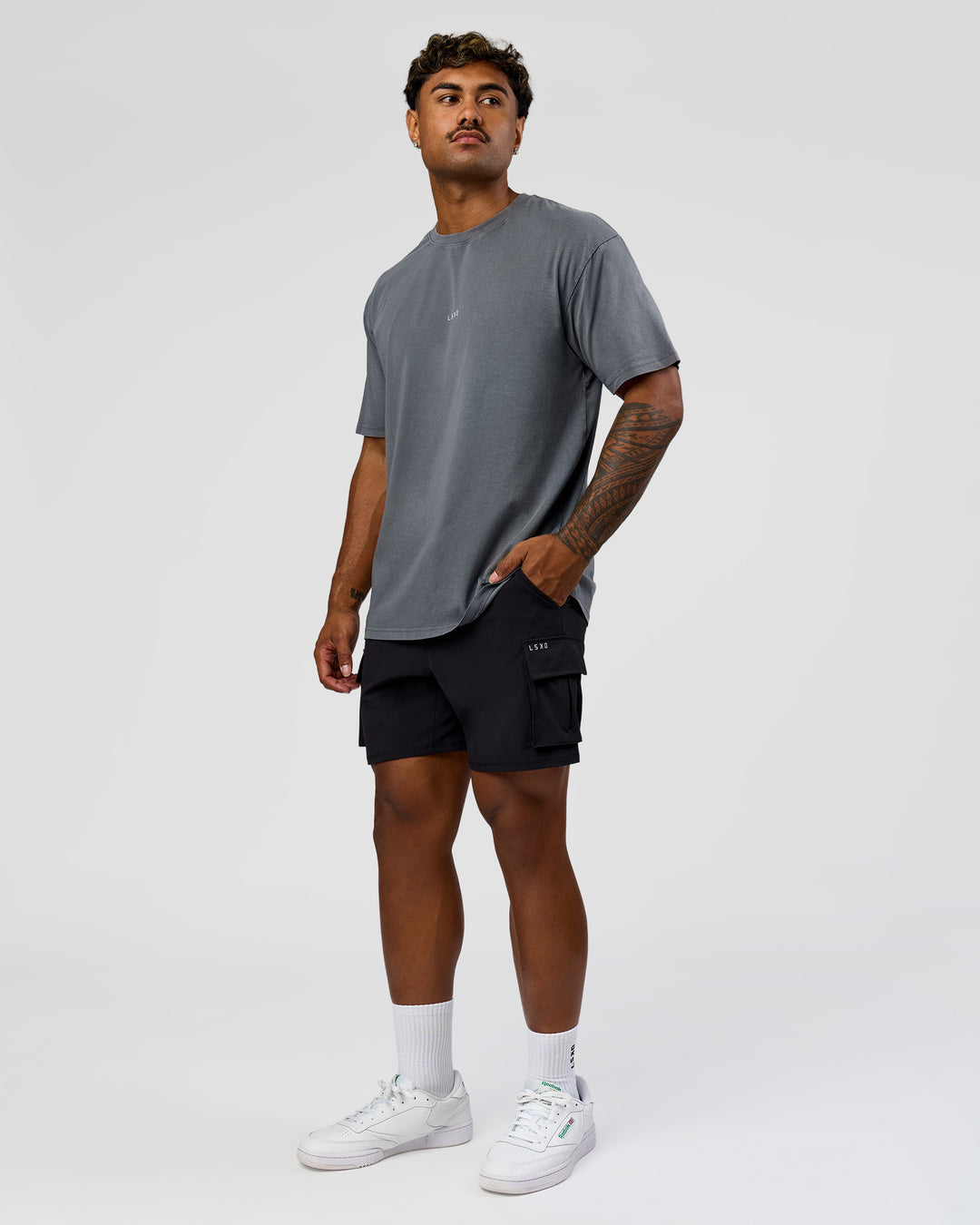 Man wearing Built On Values FLXCotton Oversized Tee - Dark Storm Washed-Pink Rose | Model:Xav | Size:L - view 7