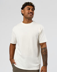 Man wearing Built On Values FLXCotton Oversized Tee - Off White-Pink Rose | Model:Xav | Size:L | Thumbnail Index: 8