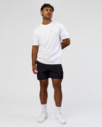 Man wearing Dare To Think FLXCotton Tee Oversize - White-Scarlet | Model:Xav | Size:L | Thumbnail Index: 7