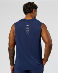 Man wearing Greatest of All Time Rep Muscle Training Tank - Future Navy-White | Model:Xav | Size:L | Thumbnail Index: 3