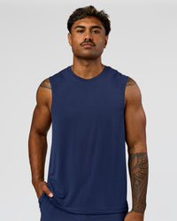 Man wearing Greatest of All Time Rep Muscle Training Tank - Future Navy-White | Model:Xav | Size:L | Thumbnail Index: 4
