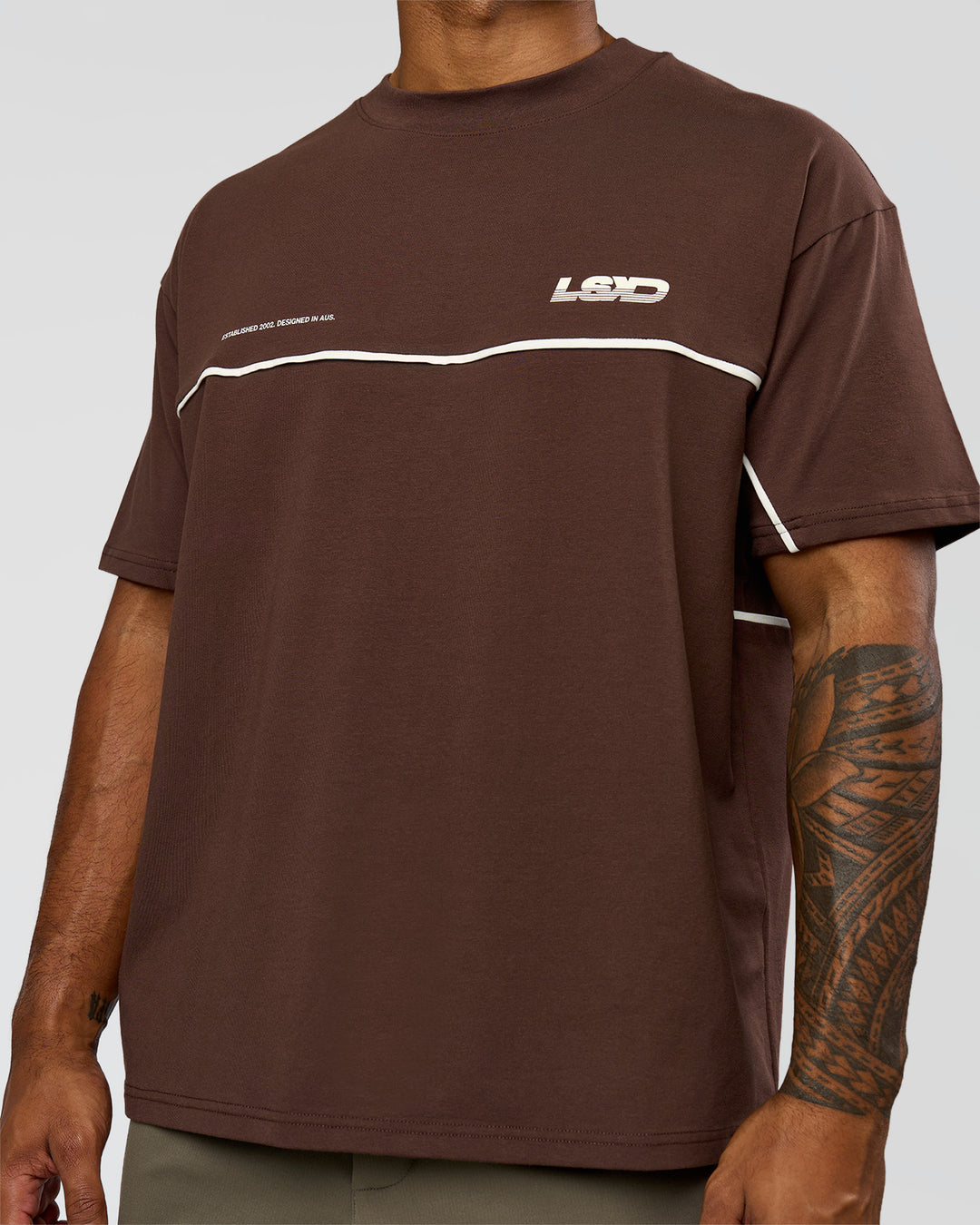 Man wearing Inline Heavyweight FLXCotton Oversized Tee - Hot Chocolate-Off White | Model:Xav | Size:L - view 6