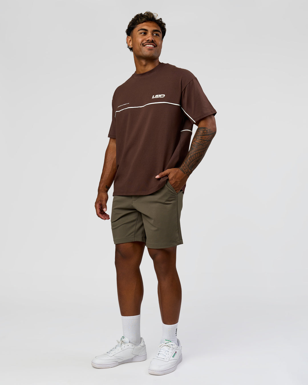 Man wearing Inline Heavyweight FLXCotton Oversized Tee - Hot Chocolate-Off White | Model:Xav | Size:L - view 9