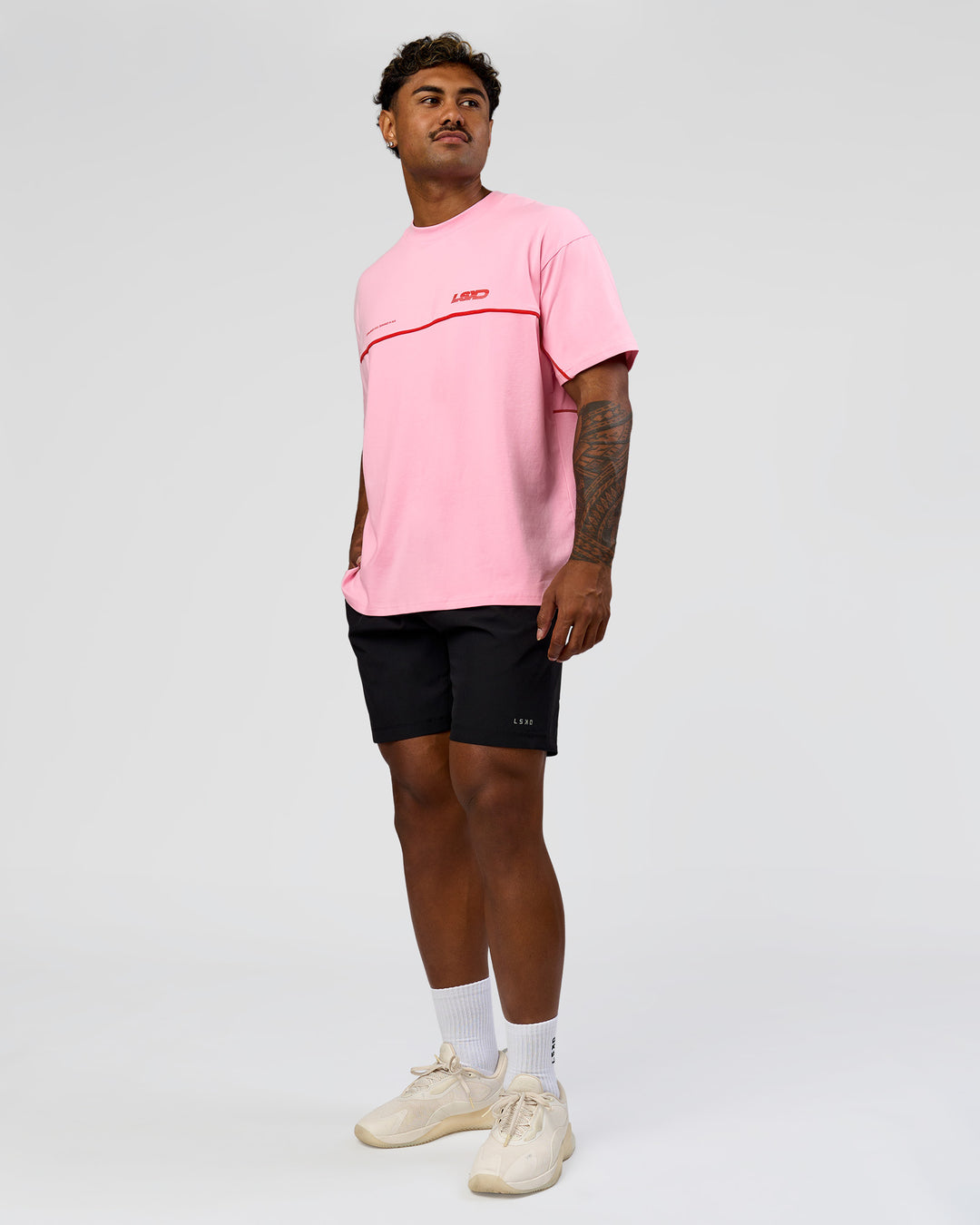 Man wearing Inline Heavyweight FLXCotton Oversized Tee - Pink Rose-Flame | Model:Xav | Size:L - view 20