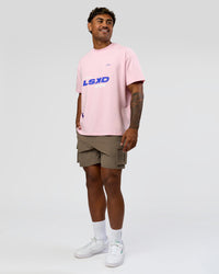 Man wearing League Heavyweight FLXCotton Oversized Tee - Marshmallow-Power Cobalt | Model:Xav | Size:L