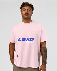 Man wearing League Heavyweight FLXCotton Oversized Tee - Marshmallow-Power Cobalt | Model:Xav | Size:L