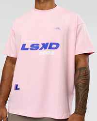 Man wearing League Heavyweight FLXCotton Oversized Tee - Marshmallow-Power Cobalt | Model:Xav | Size:L