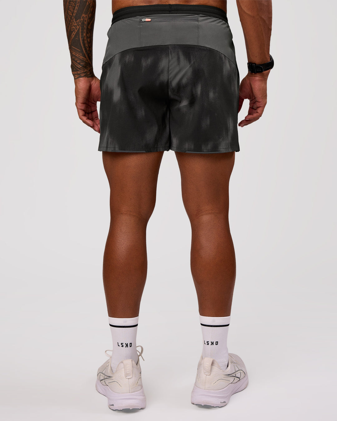 Man wearing Pace 5" Lined Running Short - Bitmap Blur Black | Model:Xav | Size:L - view 3