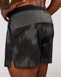 Man wearing Pace 5" Lined Running Short - Bitmap Blur Black | Model:Xav | Size:L | Thumbnail Index: 1