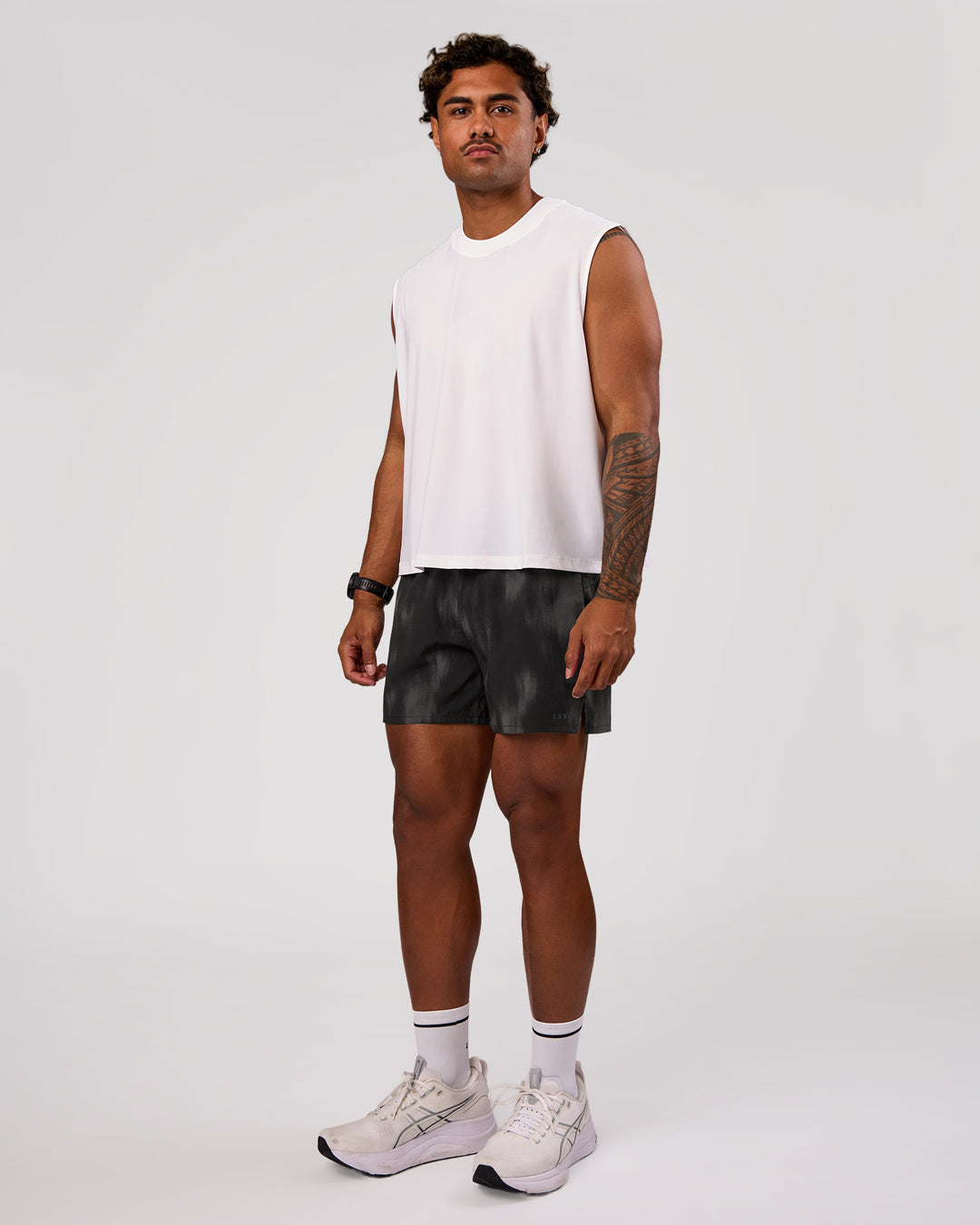 Man wearing Pace 5" Lined Running Short - Bitmap Blur Black | Model:Xav | Size:L - view 7