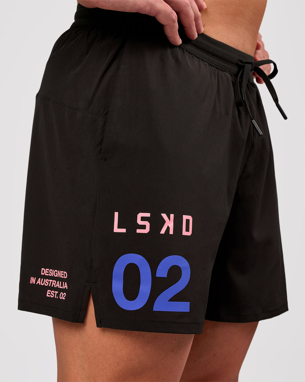 Man wearing Pace 5" Lined Running Short - Game Plan Black | Model:Xav | Size:L - view 1