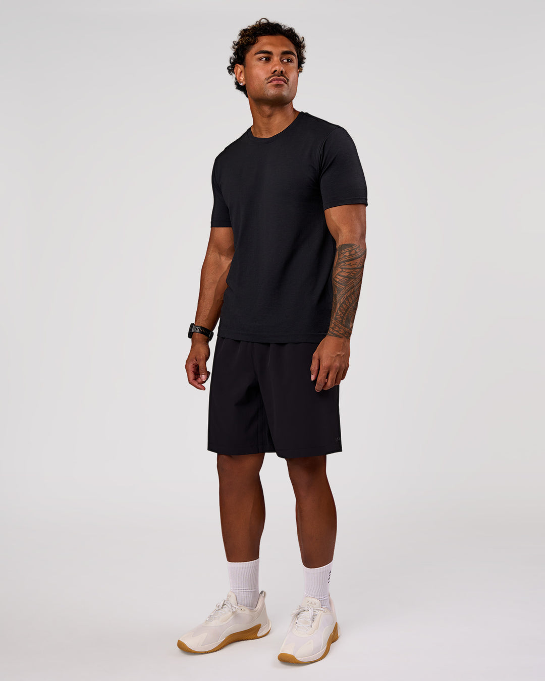 Man wearing Rep Movement 9" Training Short - Black | Model:Xav | Size:L - view 5