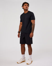 Man wearing Rep Movement 9" Training Short - Black | Model:Xav | Size:L | Thumbnail Index: 4