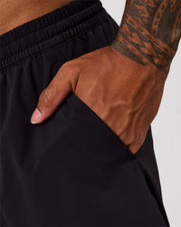 Man wearing Rep Movement 9" Training Short - Black | Model:Xav | Size:L | Thumbnail Index: 7