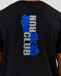 Man wearing Run Club Elevate FLXCotton Oversized Tee - Black-Electric Indigo | Model:Xav | Size:L