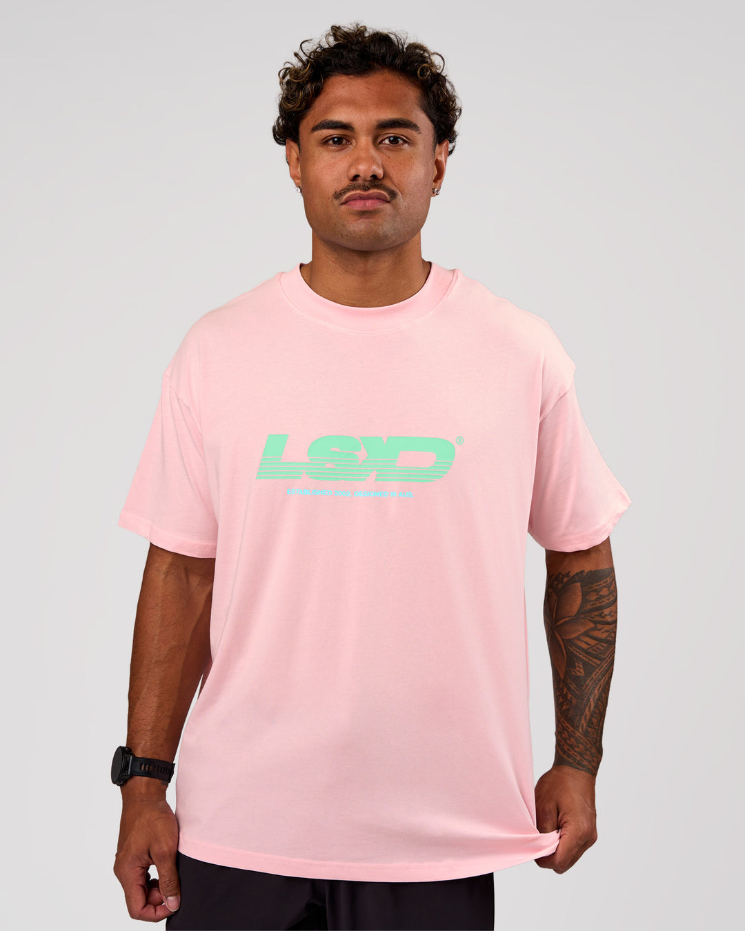 Man wearing Sideline FLXCotton Oversized Tee - Marshmallow-Jelly Mint | Model:Xav | Size:L - view 3