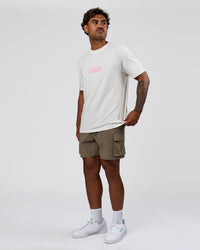 Man wearing SoCal 26 FLXCotton Oversize Tee  - Off White-Pink Rose | Model:Xav | Size:L | Thumbnail Index: 11