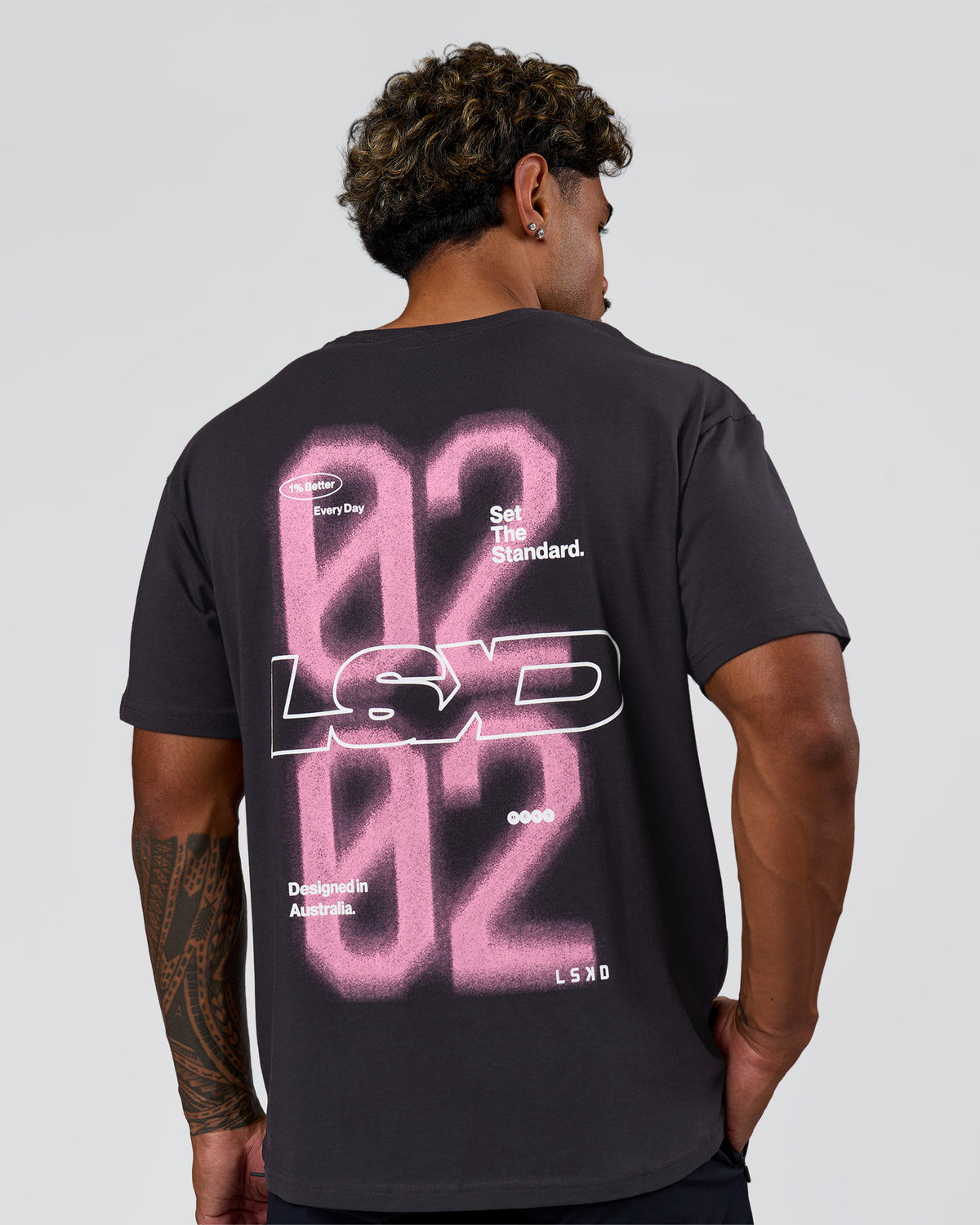 Man wearing SoCal 26 FLXCotton Oversize Tee  - Onyx-Pink Rose | Model:Xav | Size:L