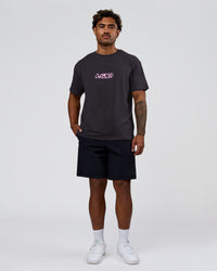 Man wearing SoCal 26 FLXCotton Oversize Tee  - Onyx-Pink Rose | Model:Xav | Size:L | Thumbnail Index: 7