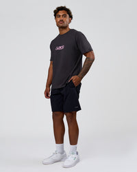 Man wearing SoCal 26 FLXCotton Oversize Tee  - Onyx-Pink Rose | Model:Xav | Size:L | Thumbnail Index: 10