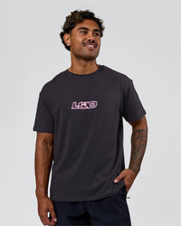 Man wearing SoCal 26 FLXCotton Oversize Tee  - Onyx-Pink Rose | Model:Xav | Size:L | Thumbnail Index: 13