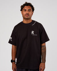 Man wearing Values Manifesto Heavyweight Oversized Tee  - Black-White | Model:Xav | Size:L | Thumbnail Index: 4