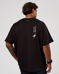 Man wearing Values Manifesto Heavyweight Oversized Tee  - Black-White | Model:Xav | Size:L | Thumbnail Index: 8