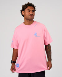 Man wearing Values Manifesto Heavyweight Oversized Tee  - Pink Rose-Open Air | Model:Xav | Size:L | Thumbnail Index: 1