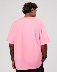 Man wearing Values Manifesto Heavyweight Oversized Tee  - Pink Rose-Open Air | Model:Xav | Size:L | Thumbnail Index: 4
