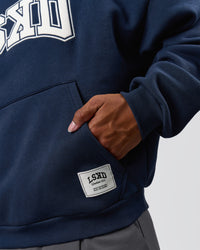 Man wearing Varsity Boxy Hoodie - Future Navy-White | Model:Xav | Size:L | Thumbnail Index: 8