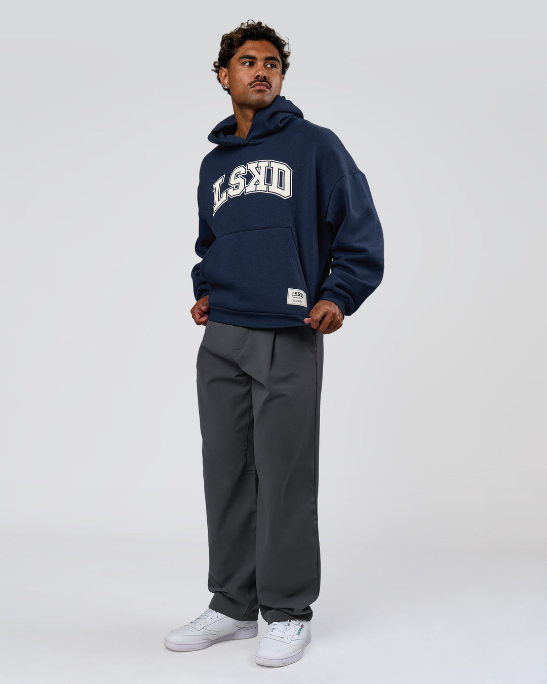 Man wearing Varsity Boxy Hoodie - Future Navy-White | Model:Xav | Size:L - view 6