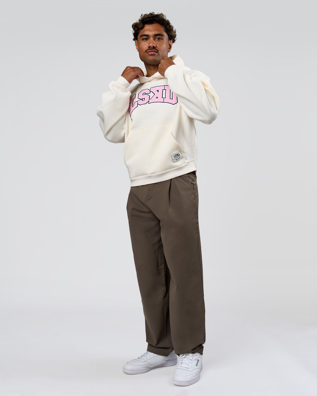 Man wearing Varsity Boxy Hoodie - Off White-Pink Rose | Model:Xav | Size:L - view 7