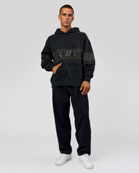 Man wearing A-Team Oversized Hoodie - Caviar-Onyx | Model:Albert | Size:M | Thumbnail Index: 8