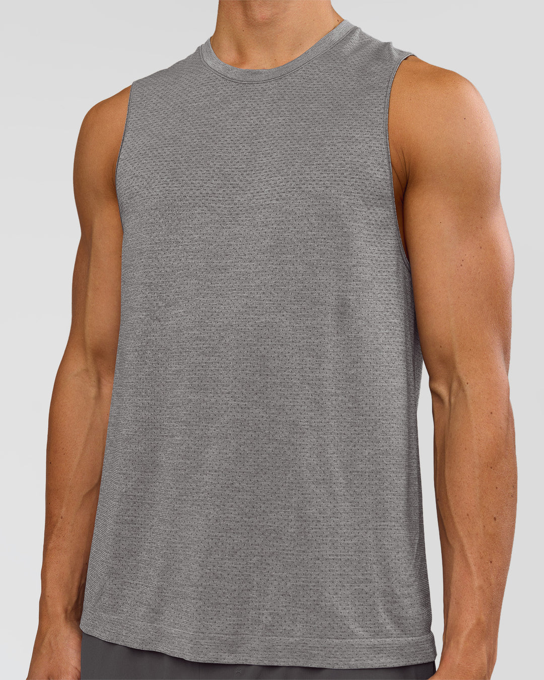 Man wearing AeroFLX+ Seamless Muscle Tank - Dark Storm/Alloy | Model:Albert | Size:M - view 3