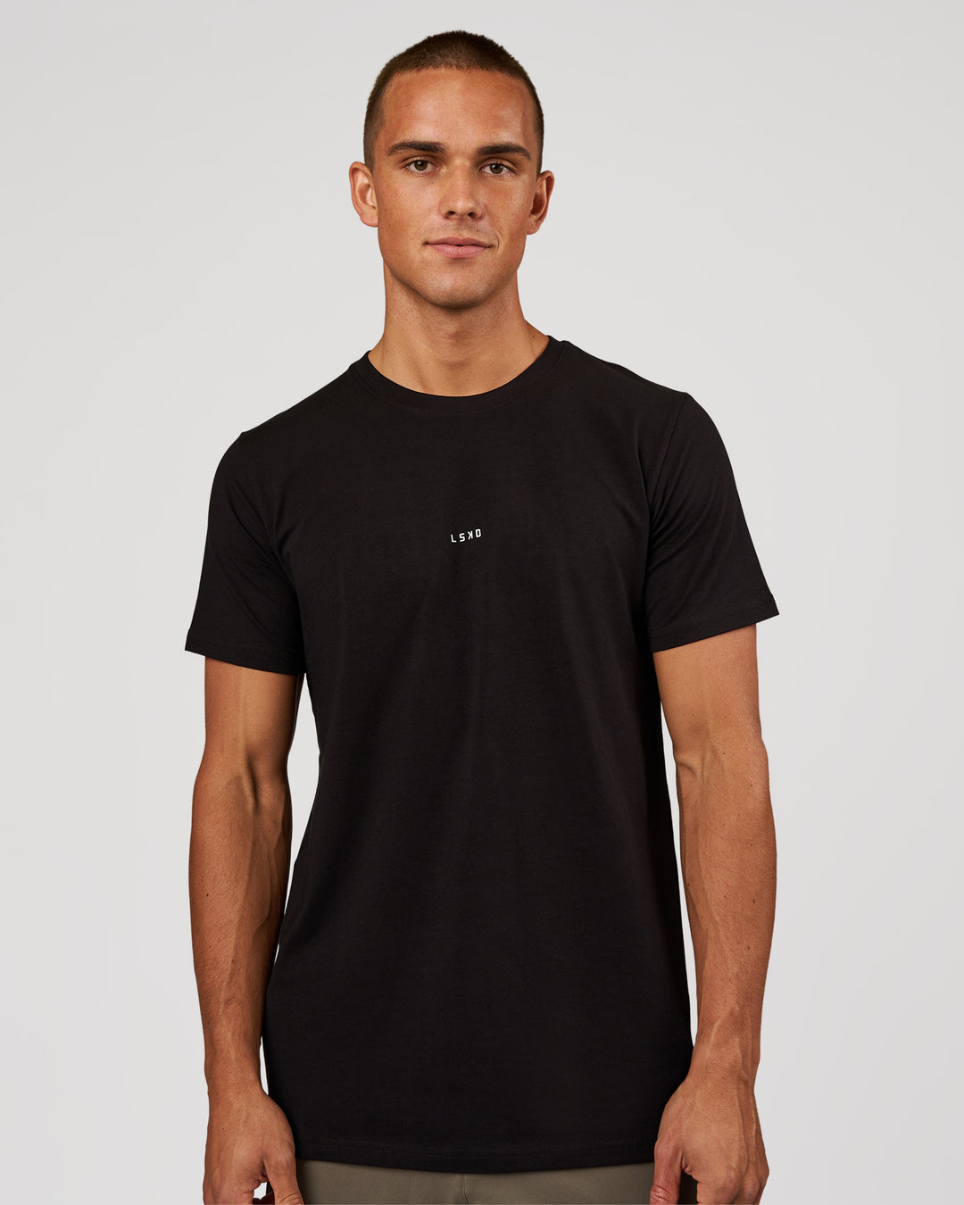 Man wearing Base FLXCotton Tee - Black | Model:Albert | Size:M - view 1