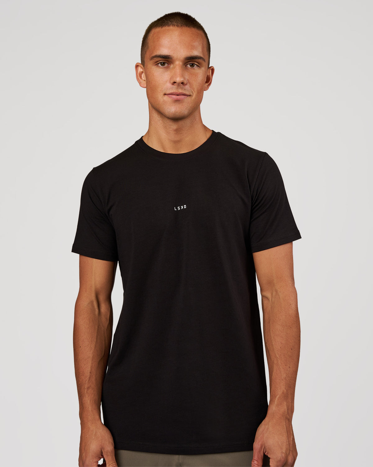 Man wearing Base FLXCotton Tee - Black | Model:Albert | Size:M