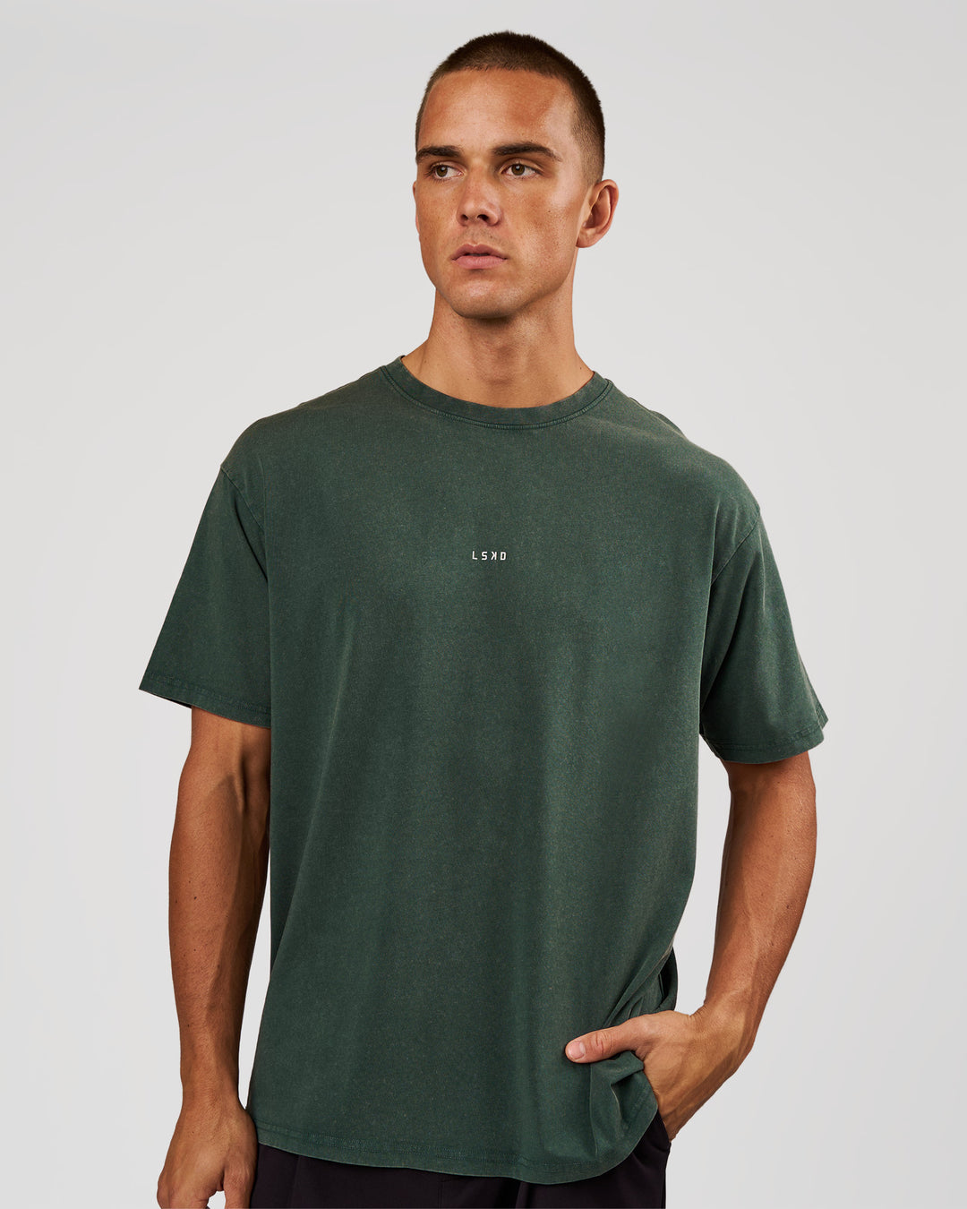 Man wearing Base FLXCotton Tee - Midnight Green Washed | Model:Albert | Size:M - view 1