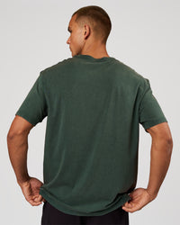 Man wearing Base FLXCotton Tee - Midnight Green Washed | Model:Albert | Size:M | Thumbnail Index: 4