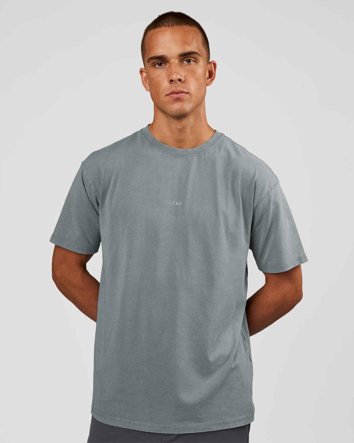 Man wearing Base FLXCotton Tee Oversized - Blue Mirage Washed | Model:Albert | Size:M