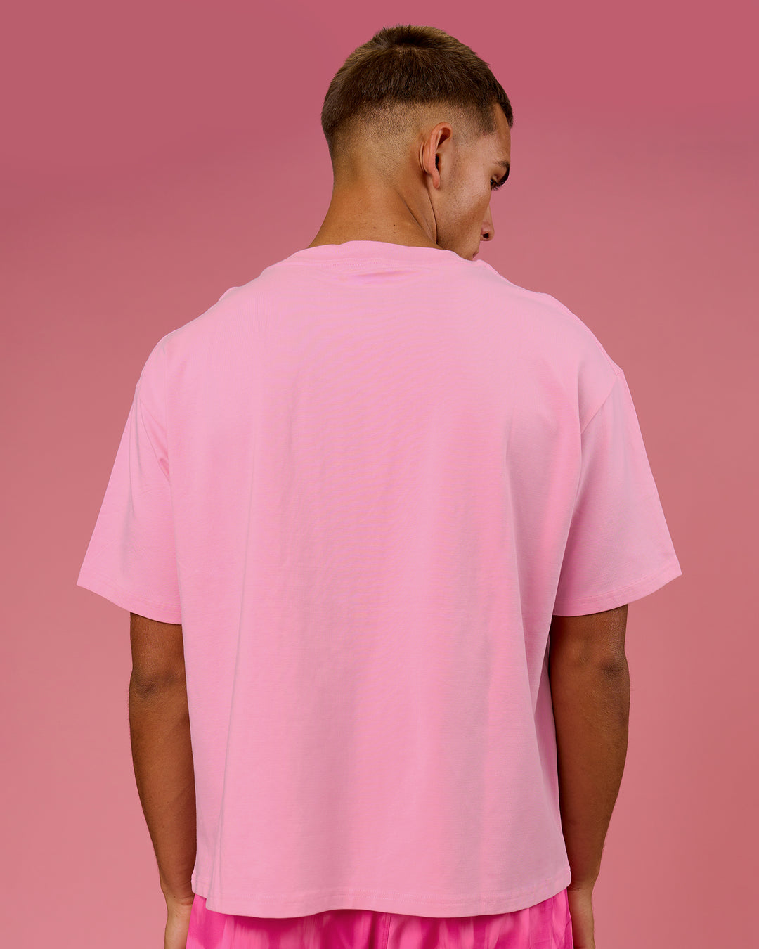 Man wearing BCAM Heavyweight FLXCotton Graphic Boxed Tee - Pink Rose | Model:Albert | Size:M - view 7