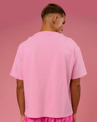 Man wearing BCAM Heavyweight FLXCotton Graphic Boxed Tee - Pink Rose | Model:Albert | Size:M | Thumbnail Index: 6