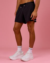 Man wearing BCAM Pace 5" Lined Running Short - Black | Model:Albert | Size:M | Thumbnail Index: 5