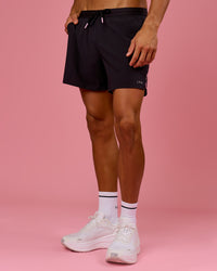 Man wearing BCAM Pace 5" Lined Running Short - Black | Model:Albert | Size:M | Thumbnail Index: 6