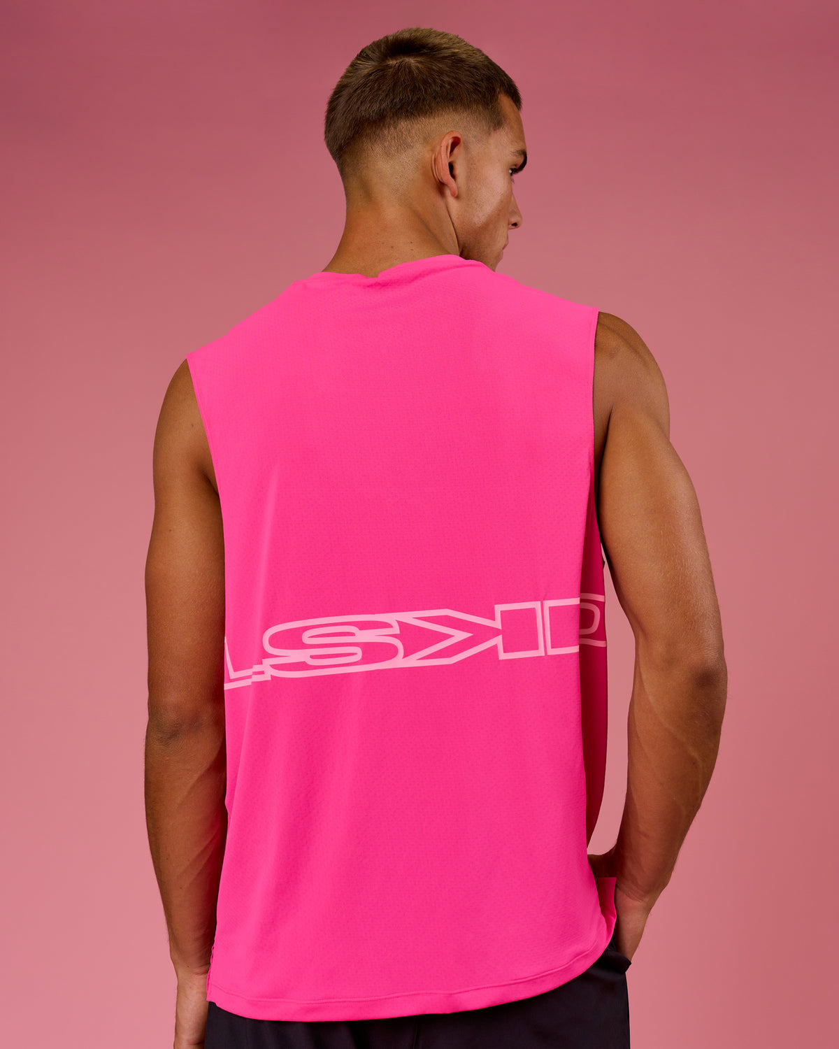 Man wearing BCAM Rep Muscle Training Tank - Ultra Pink | Model:Albert | Size:M