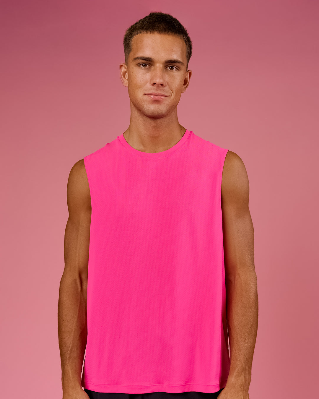 Man wearing BCAM Rep Muscle Training Tank - Ultra Pink | Model:Albert | Size:M - view 2