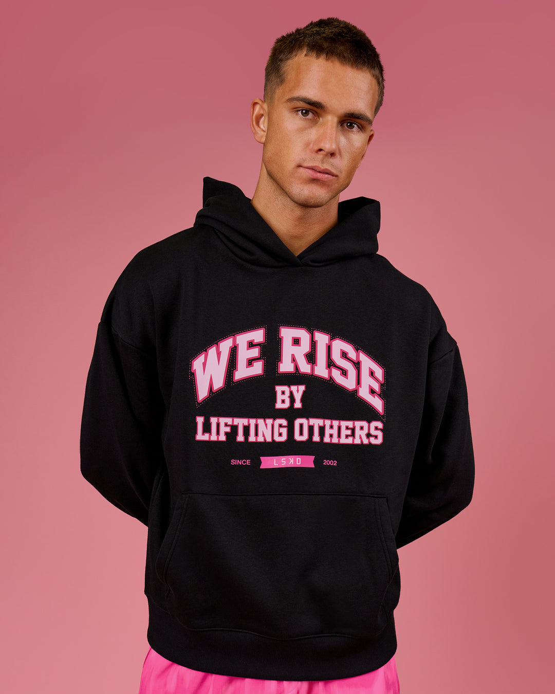 Man wearing BCAM Unisex Oversized Hoodie - Black | Model:Albert | Size:M - view 2