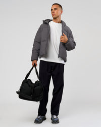 Man wearing Blackout Puffer Jacket - Dark Storm-Black | Model:Albert | Size:M | Thumbnail Index: 8