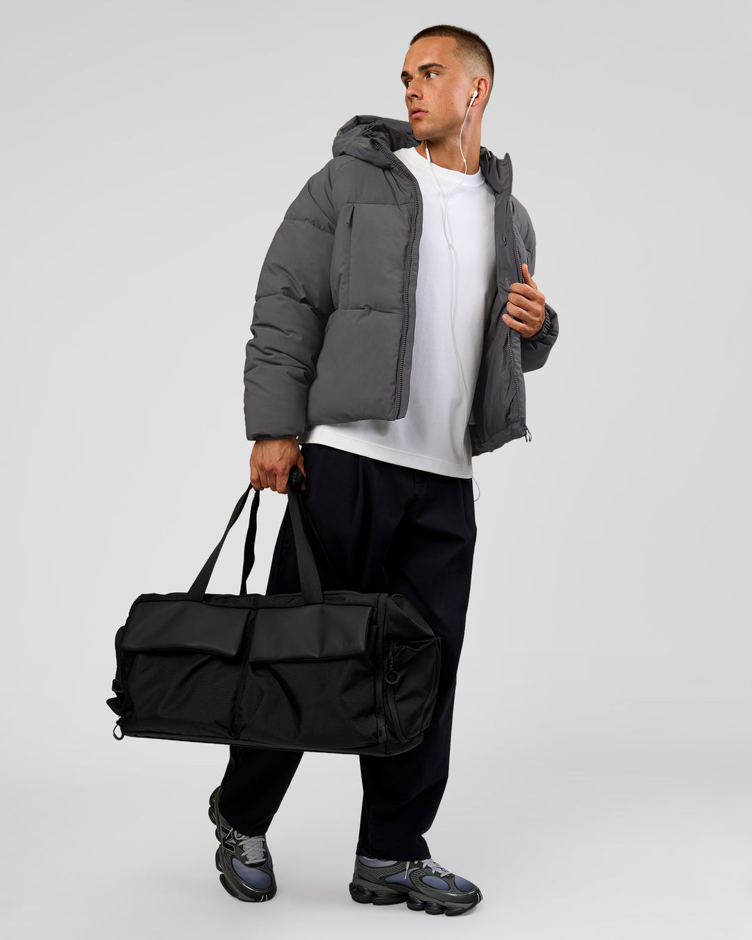 Man wearing Blackout Puffer Jacket - Dark Storm-Black | Model:Albert | Size:M - view 15