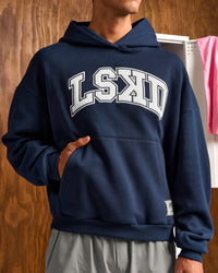 Man wearing Varsity Boxy Hoodie - Future Navy-White | Model:Albert | Size:M | Thumbnail Index: 4
