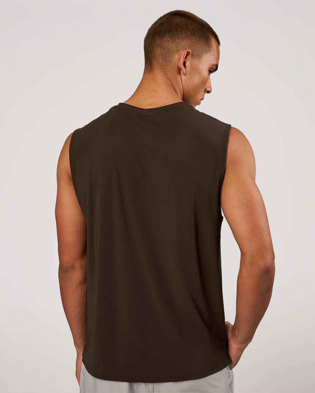 Man wearing Cadence MicroMotion Muscle Tank - Ground Coffee | Model:Albert | Size:M - view 3